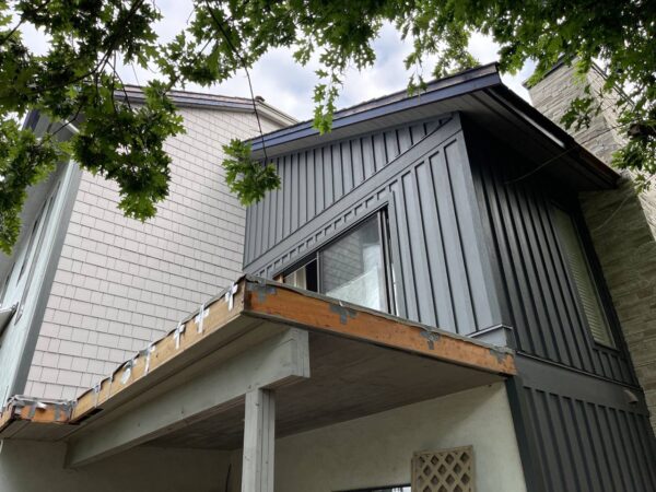 Exterior upgrade with new James Hardie Panel siding installed