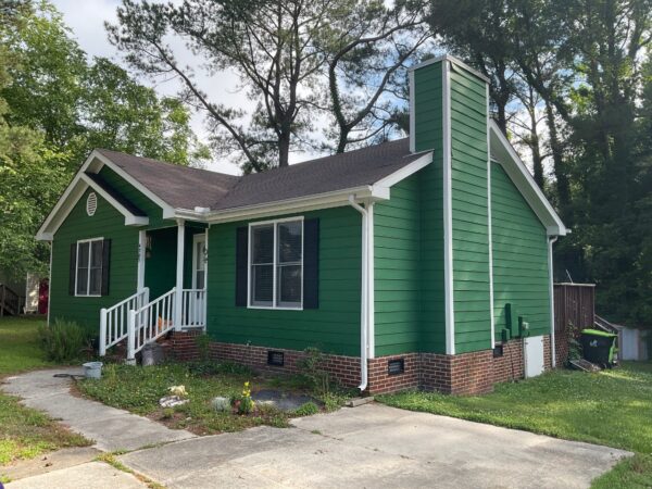 Finished partial siding installation on residential home