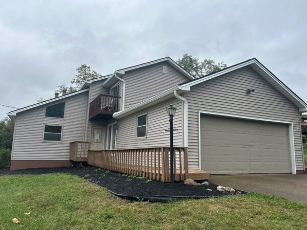 Vinyl exterior siding project before and after
