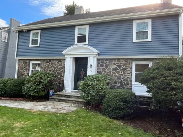 Full house vinyl renovation with PVC trim on doors, windows and fascia.