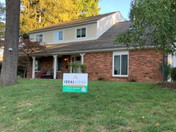 Replaced stucco with James Hardie Planks in Navajo Beige