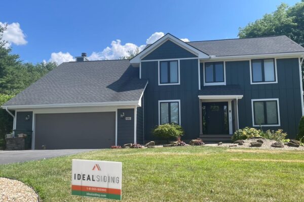 Removed old cedar and replaced with Hardie, vinyl soffits and wrapped fascias.