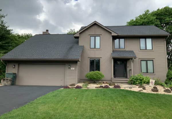 Removed old cedar and replaced with Hardie, vinyl soffits and wrapped fascias.