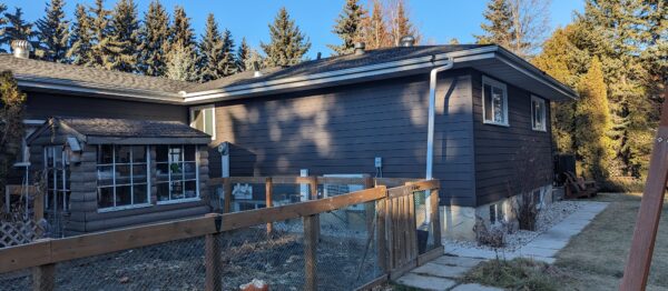 Remove Stucco and install 1” insulation and 6” Armour Side Lap siding in tuscan coffee