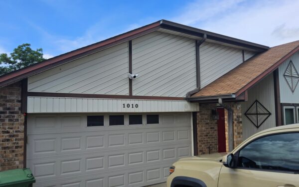 Wood to insulated composite board & batten