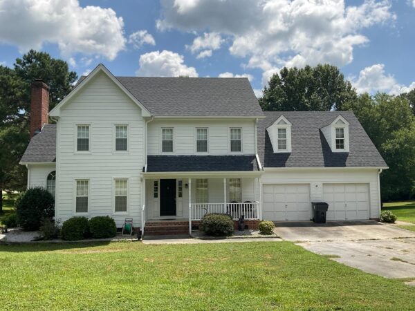Replaced White Masonite with White Hardie Full house siding