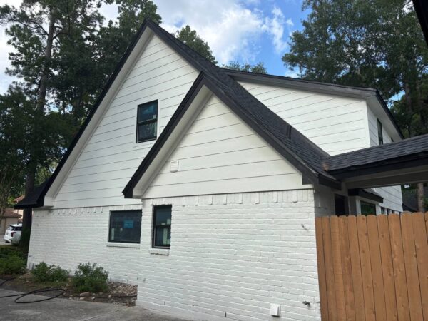 Installation of 12” James Hardie siding