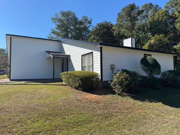 REPLACED CEDAR LAP SIDING WITH JAMES HARDIE 8.25