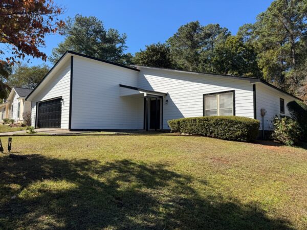 REPLACED CEDAR LAP SIDING WITH JAMES HARDIE 8.25