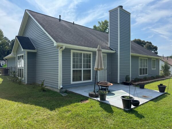 REPLACED MASONITE SIDING WITH WESTLAKE ROYAL ESTATE D5 IN SILVERMIST