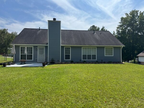 REPLACED MASONITE SIDING WITH WESTLAKE ROYAL ESTATE D5 IN SILVERMIST