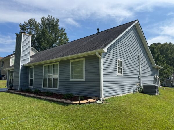 REPLACED MASONITE SIDING WITH WESTLAKE ROYAL ESTATE D5 IN SILVERMIST