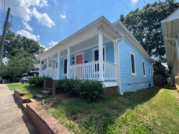 WOOD LAP SIDING REPLACED WITH JAMES HARDIE PRIMED 8.25