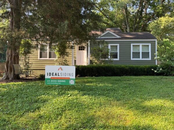 REPLACED SIDING WITH JAMES HARDIE C+ MOUNTAIN SAGE AND C+ ARCTIC WHITE TRIMS
