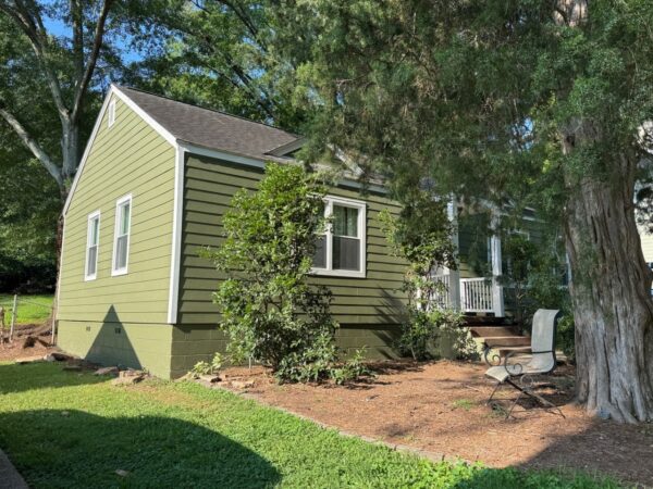 REPLACED SIDING WITH JAMES HARDIE C+ MOUNTAIN SAGE AND C+ ARCTIC WHITE TRIMS