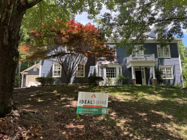CEDAR SHINGLES REPLACED WITH JAMES HARDIE STRAIGHT SHINGLES AND 8.25