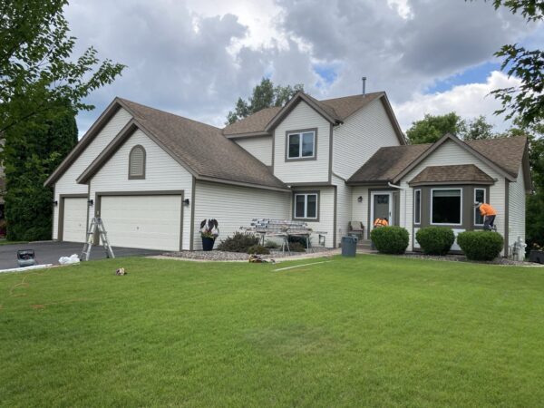Removed wood trim boards - installed new James Hardie trim boards in Khaki Brown color.