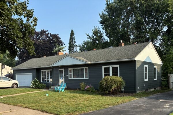 Removed wood siding and installed new 7