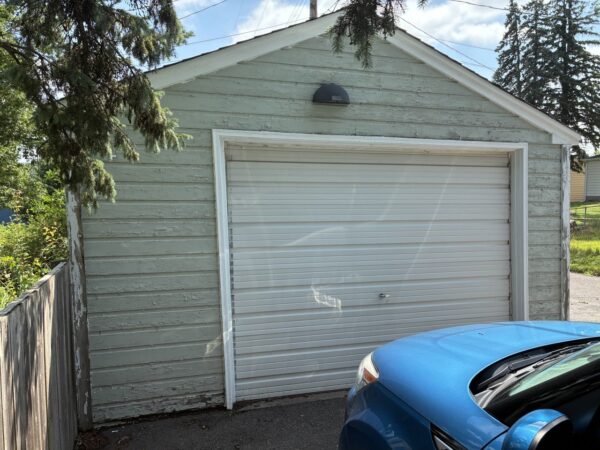 Installed new vinyl D4 (4 inch reveal) horizontal plank siding by Mastic, Carvedwood line in Sage color