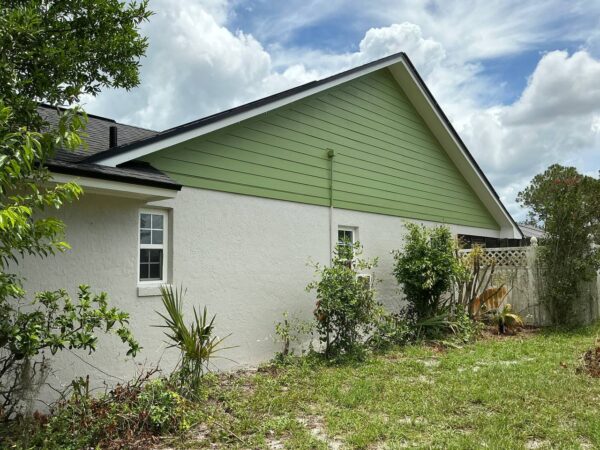 Wood to Hardie Lap Cedarmill 8” Primed painted green Hardie Smooth trim 4” and 6”