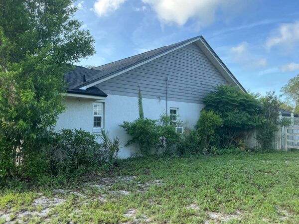 Wood to Hardie Lap Cedarmill 8” Primed painted green Hardie Smooth trim 4” and 6”