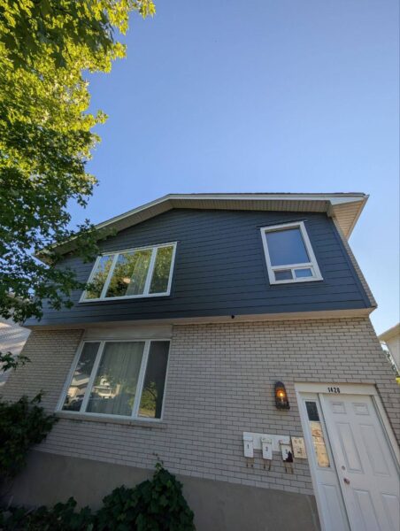 James Hardie Iron Grey Planks and Trim full house renovation