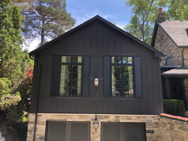 Complete construction excepted the stone areas James Hardie Smooth Panels B&B every 18” on Midnight Black