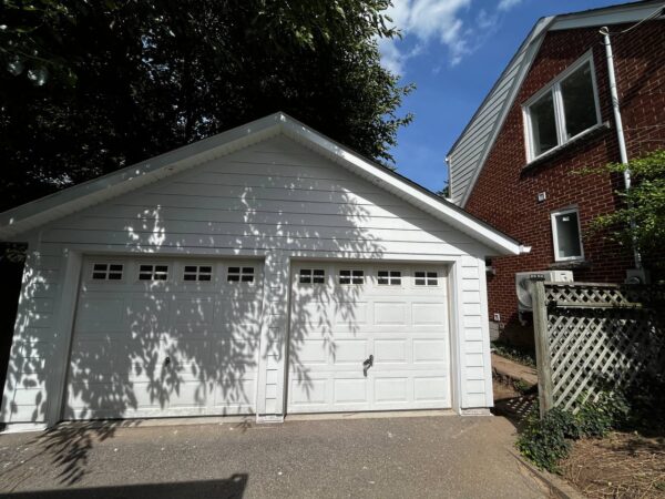Complete renovation of the garage and the house, including new additions. From vinyl and aluminum to JH Planks and Panels 1” of insulation