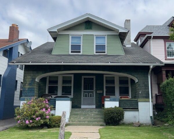 From Aluminum and Cedar Shingle Shake to Mastic Ovation Vinyl Lap Siding in Scottish Thistle.