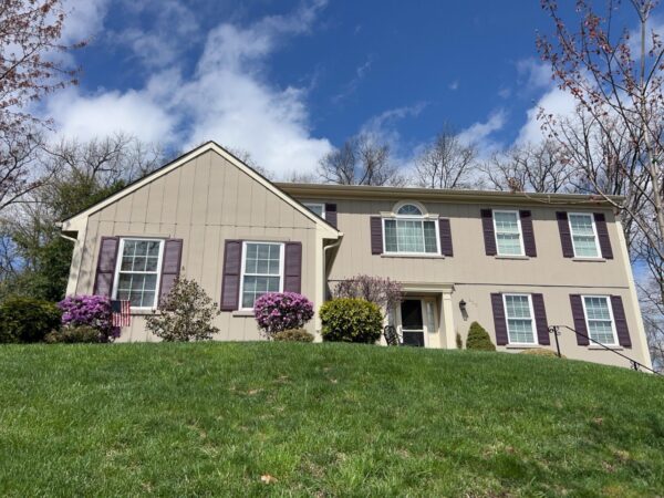 Wood T1-11 to Everlast Lap Siding in Antique Ivory (Trim) and Misty Taupe (Siding).