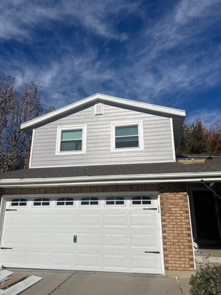 James Hardie Cedarmill Lap Siding in Pearl Gray with Arctic White trims and corners