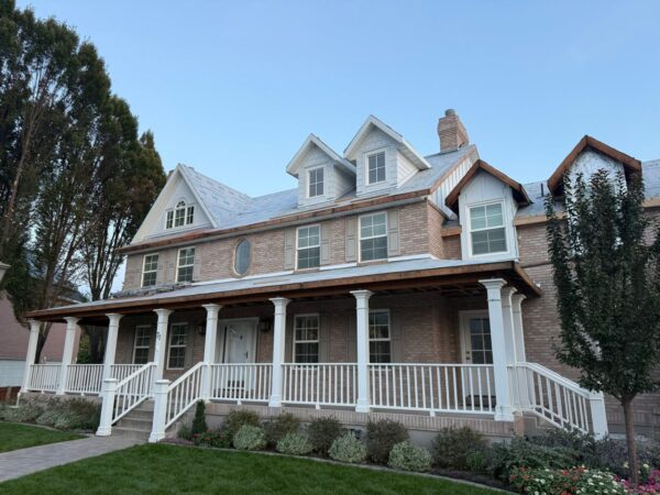 James Hardie Cedarmill Lap, Board and Batten, and Straight Shingle Siding in ColorPlus finish with Arctic White trims and corners