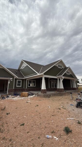 James Hardie Cedarmill Lap and Straight Shingle Siding in Mountain Sage with Arctic White accents