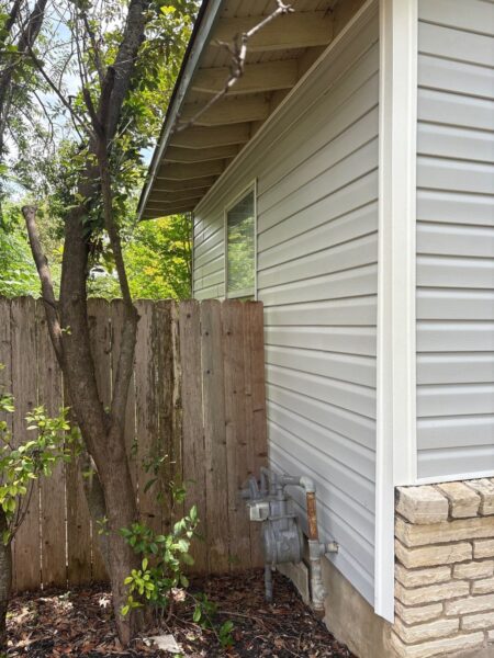 Completed siding repairs by removing the siding from the specified areas, inspecting the sheathing, installing new building paper, and installing new vinyl siding with matching trims and corners.