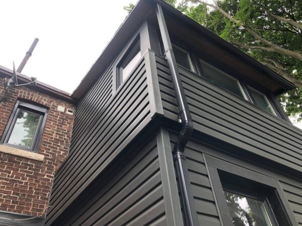 Replacement old siding, trims, soffits and gutter Vinyl Dutch 5” laps in Iron Ore