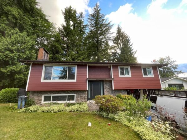 Exterior upgrade with new red James Hardie siding installed