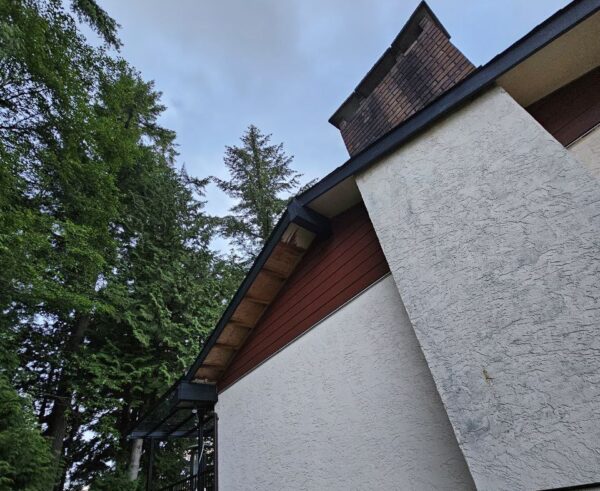 Exterior upgrade with new red James Hardie siding installed