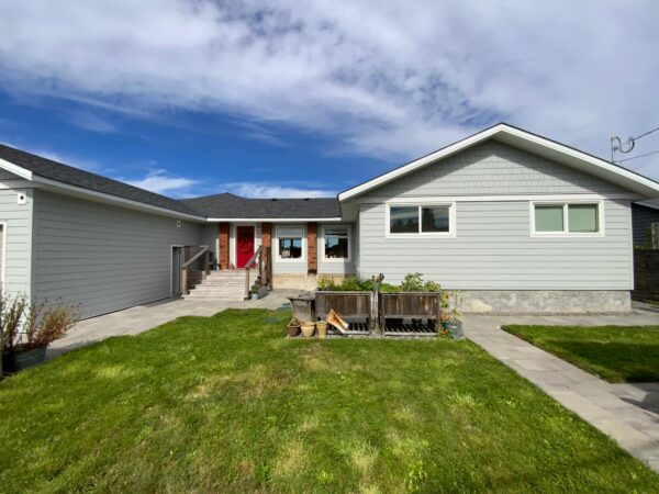 Residential home siding improvement project in Light Mist