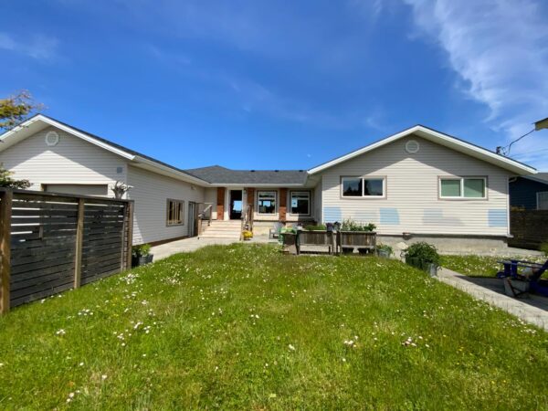 Residential home siding improvement project in Light Mist