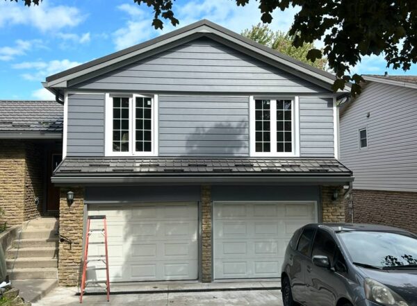 Replacement of aluminum siding/soffit/fascia/eaves to Everlast Flagstone PVC Horizontal