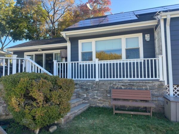 JH plank in deep ocean with Azek trims soffit and fascia.