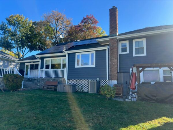 JH plank in deep ocean with Azek trims soffit and fascia.