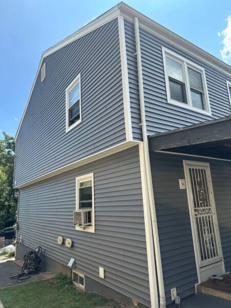 Completed residential vinyl siding replacement