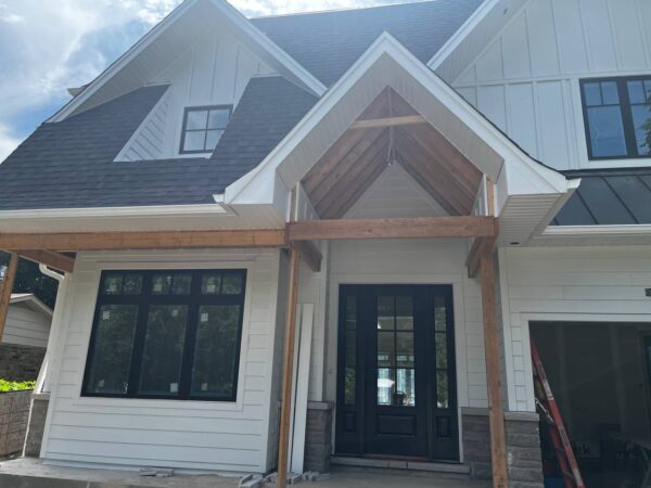 Full house renovation with James Hardie Cedarmill planks and JH B&B 16” spacing Smooth Panels